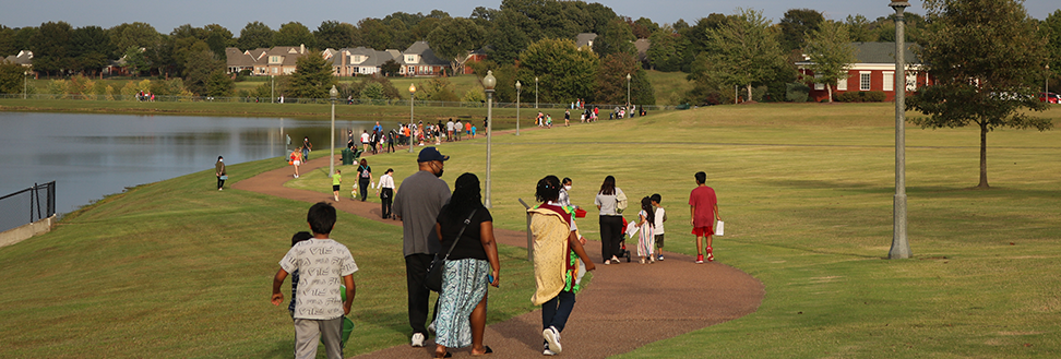 Storywalk-at-fall-festival-2021-people-on-path